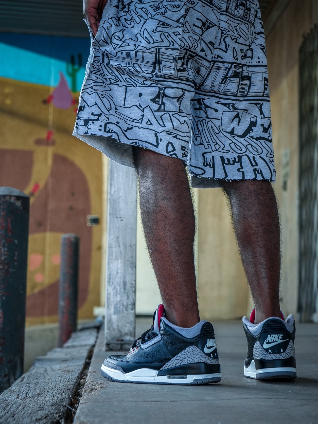 Light grey graffiti shorts